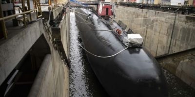 SILVERDALE, Wash. (Feb. 18, 2021) - Trident Refit Facility Bangor (TRFB) preps the Ohio-class ballistic missile submarine USS Nevada (SSBN 733) for undocking after completing an Extended Refit Period (ERP) at TRFB's Delta Pier. The undocking occurred on time and on the original Chief of Naval Operations (CNO) availability schedule with TRFB completing 1,398 jobs, totaling 57,381 man-days to date. TRFB was established in the Pacific Northwest on July 1, 1981, as the primary maintenance facility for the West Coast Ballistic Missile Submarine (SSBN) fleet. TRFB’s principal mission is to support the nation’s strategic deterrence mission by repairing, incrementally overhauling, and modernizing the Ohio-class and the future Columbia-class until the end of service life. The TRFB team is comprised of approximately 500 military and 1,500 civilians. (U.S. Navy Photo by Mass Communication Specialist 2nd Class Heather C. Wamsley/released)